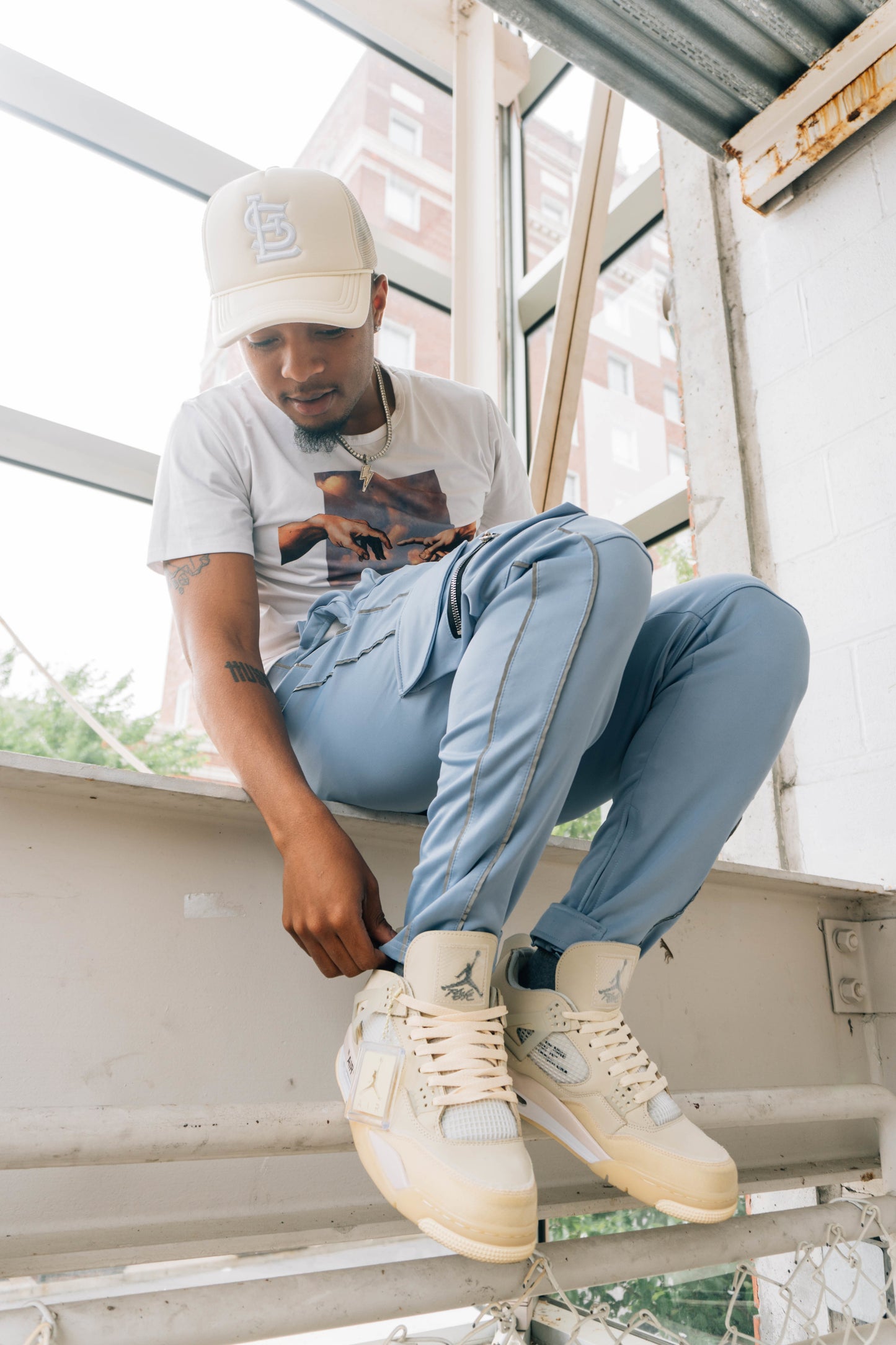 Cream STL Trucker Hat