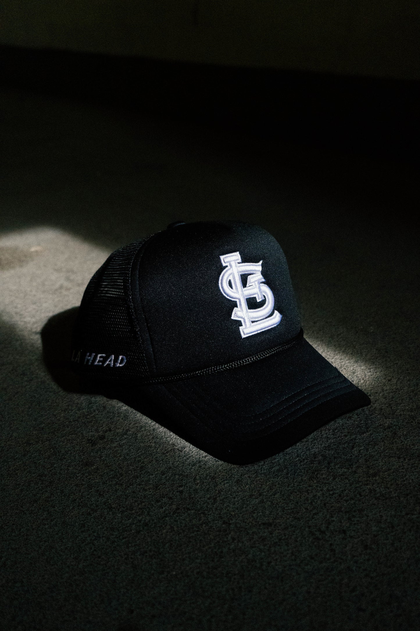 Black STL Trucker Hat